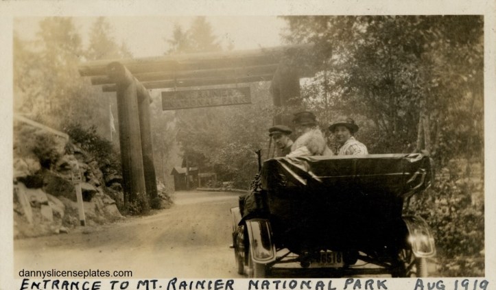 Old car at the entrance of Mt. Rainier National Park