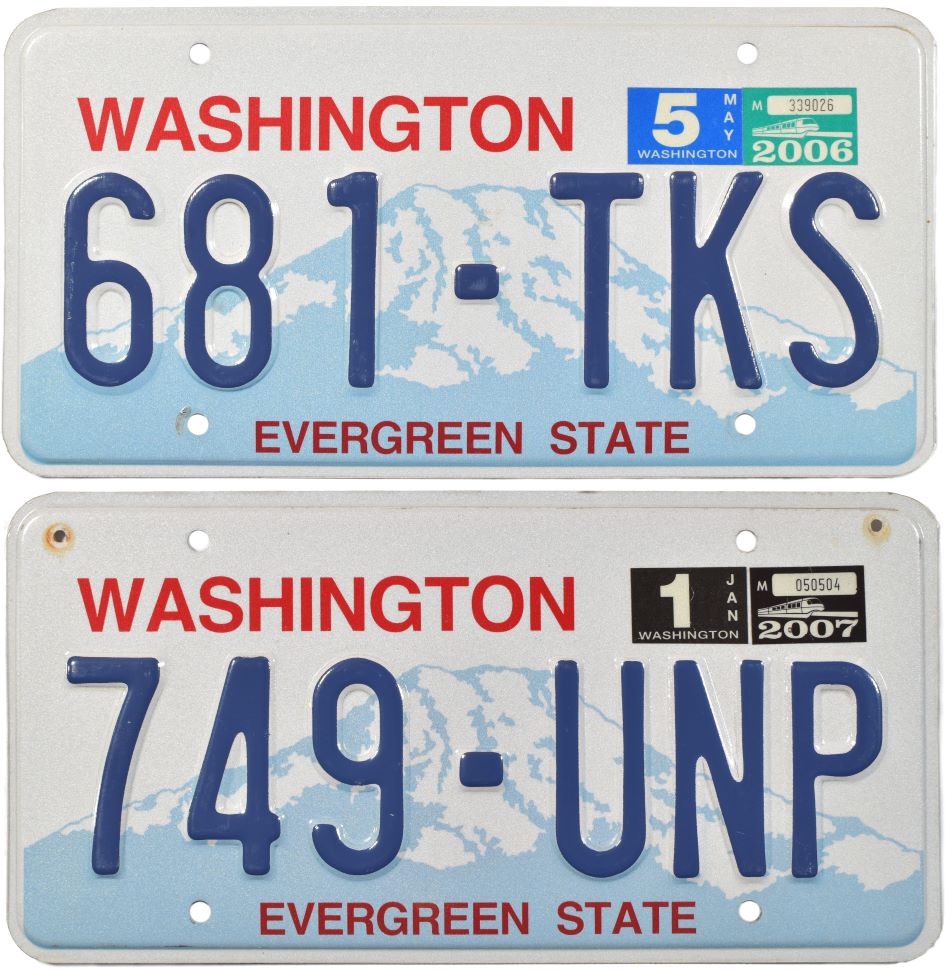 Washington state license plates depicting 2006 and 2007 monorail stickers