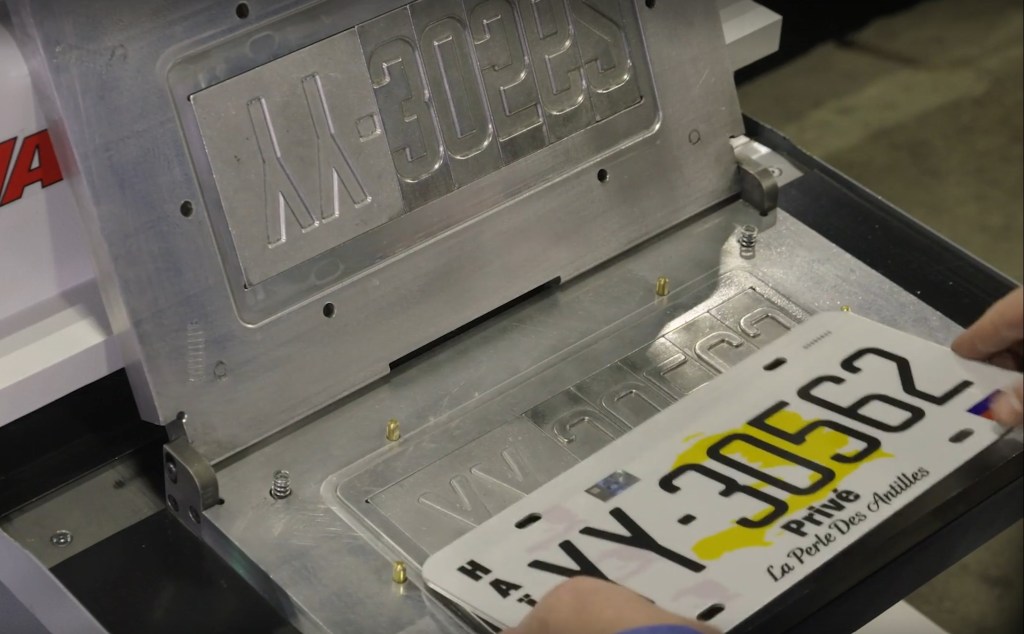 JR Wald print-to-emboss license plate technology