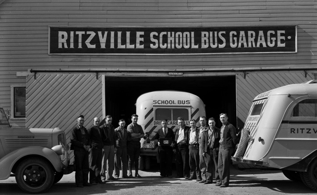 Photo of Ritzville School District bus drivers in 1938, unveiling American Red Cross First Aid Kits