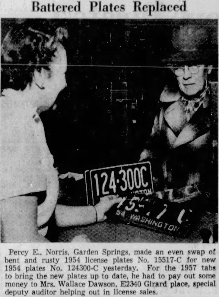 A Spokane resident receiving new 1957 Washington license plates.