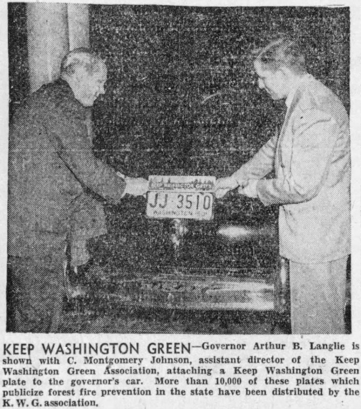 Washington Governor Arthur B Langlie applying a Keep Washington Green license plate topper to his car