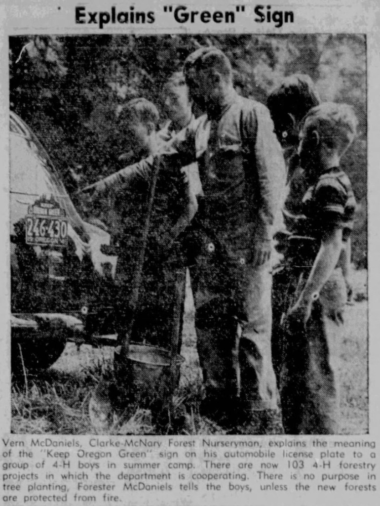 Newspaper photo of a Keep Oregon Green license plate topper in 1941