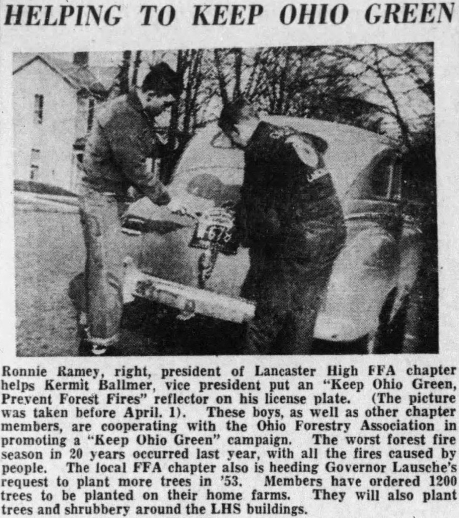 Newspaper photo of a Keep Ohio Green license plate topper in use in 1953